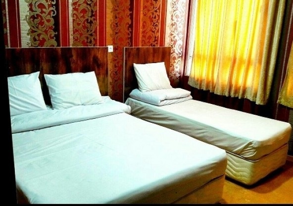 اتاق سه تخته خواب در هتل آپارتمان عطاران مشهدرزرو هتل-های